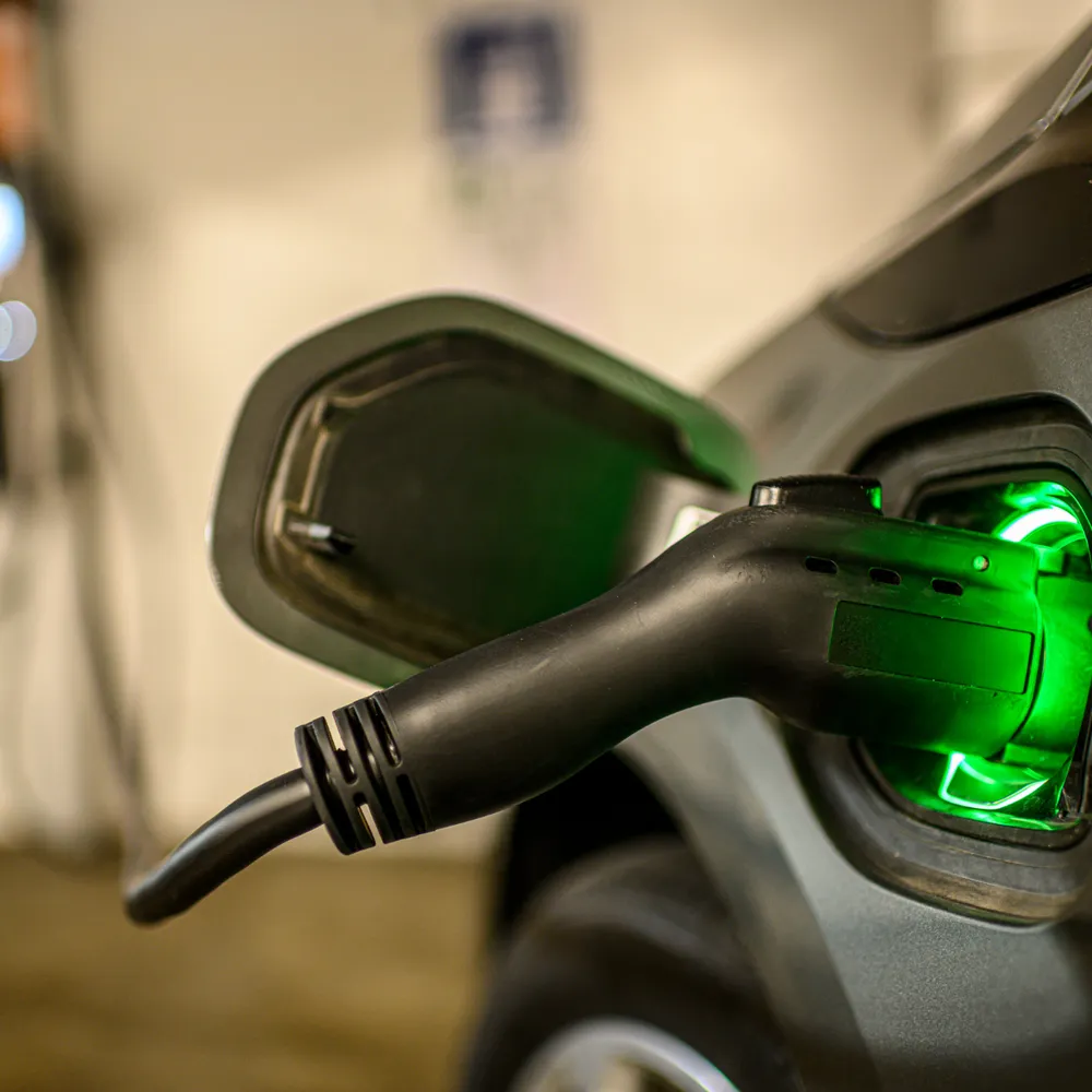 Electric vehicle charging with a green-lit port