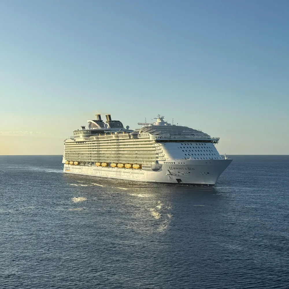 Cruise ship approaching port at dawn